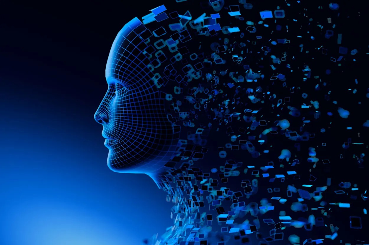 Alt text: A Man with short dark hair in a suit stands confidently against a vibrant, abstract background with flowing shapes in blue, yellow, and white.